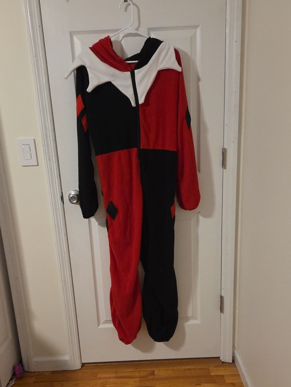 Rubies Women's DC Super Heroes Harley Quinn Hooded Jumpsuit, Adult Sized Costume